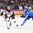 COLOGNE, GERMANY - MAY 9:  Latvia's Oskars Cibulskis #27 plays the puck while Italy's Giulio Scandella #10 chases him down during preliminary round action at the 2017 IIHF Ice Hockey World Championship. (Photo by Andre Ringuette/HHOF-IIHF Images)

